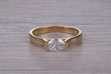 Half carat Oval cut Certified Natural Diamond set 18ct Yellow Gold Solitaire