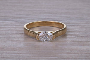 Half carat Oval cut Certified Natural Diamond set 18ct Yellow Gold Solitaire