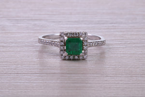 Square cut Natural Emerald Halo and Shoulder set With Diamonds in This 18ct White Gold Ring