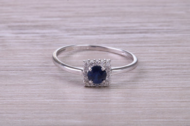 Dainty Sapphire and Halo set Diamond 18ct White Gold Ring