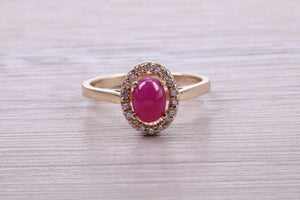 Stunning Cabochon cut 1.40 carat Ruby and Halo set Diamond Ring in Yellow Gold