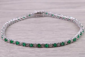 Four and Half carats Natural Emeralds and Diamonds set White Gold Tennis Bracelet, British Hallmarked
