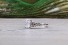 Load image into Gallery viewer, One carat Emerald cut Moissanite Diamond with Natural Diamonds set Ring