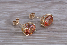 Load image into Gallery viewer, Oval cut Azotic Topaz set Yellow Gold Stud Earrings