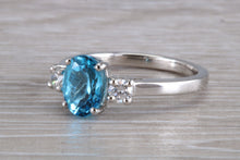 Load image into Gallery viewer, Blue Topaz and Diamond set Platinum Trilogy Ring