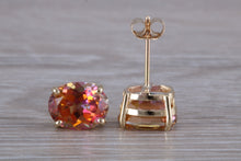 Load image into Gallery viewer, Oval cut Azotic Topaz set Yellow Gold Stud Earrings