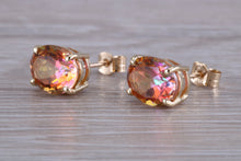 Load image into Gallery viewer, Oval cut Azotic Topaz set Yellow Gold Stud Earrings
