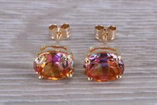 Load image into Gallery viewer, Oval cut Azotic Topaz set Yellow Gold Stud Earrings