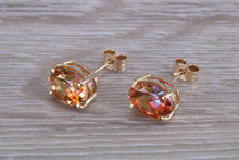 Load image into Gallery viewer, Oval cut Azotic Topaz set Yellow Gold Stud Earrings
