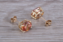 Load image into Gallery viewer, Oval cut Azotic Topaz set Yellow Gold Stud Earrings