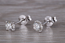 Load image into Gallery viewer, Timeless One carat Diamond Solitaire Stud Earrings