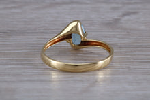 Load image into Gallery viewer, One carat Oval cut Blue Topaz set 18ct Yellow Gold Ring