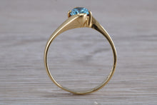 Load image into Gallery viewer, One carat Oval cut Blue Topaz set 18ct Yellow Gold Ring