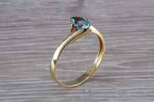 Load image into Gallery viewer, One carat Oval cut Blue Topaz set 18ct Yellow Gold Ring