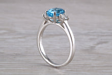Load image into Gallery viewer, Blue Topaz and Diamond set Platinum Trilogy Ring