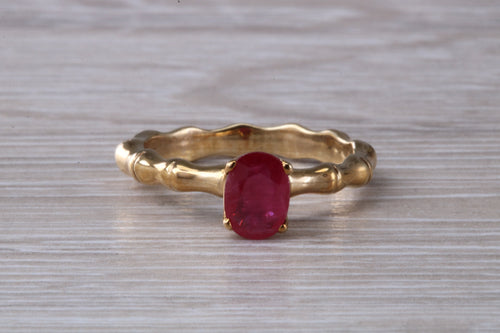 One carat Oval cut Ruby set Tree Branch Solitaire