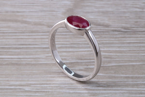 1.25 carat Oval cut Ruby set 18ct White Gold Solitaire