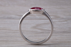 1.25 carat Oval cut Ruby set 18ct White Gold Solitaire
