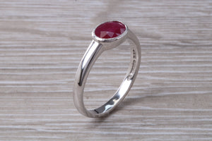1.25 carat Oval cut Ruby set 18ct White Gold Solitaire