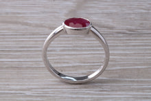 Load image into Gallery viewer, 1.25 carat Oval cut Ruby set 18ct White Gold Solitaire