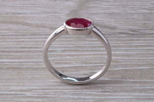 1.25 carat Oval cut Ruby set 18ct White Gold Solitaire
