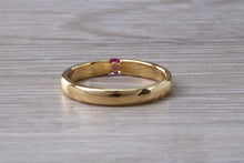 Load image into Gallery viewer, Tension set Natural Ruby Gold Band