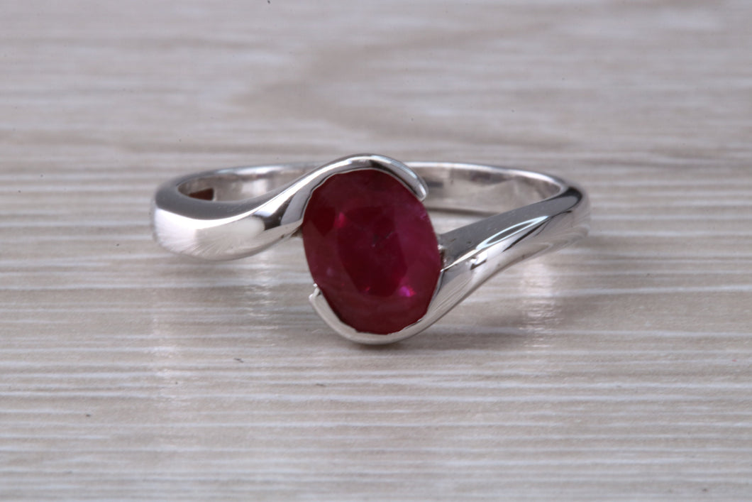 Oval cut Ruby set Crossover Ring