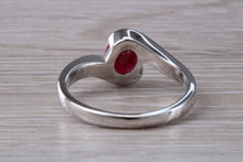 Load image into Gallery viewer, Oval cut Ruby set Crossover Ring