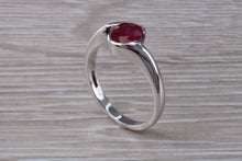 Load image into Gallery viewer, Oval cut Ruby set Crossover Ring