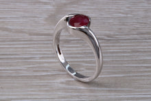 Load image into Gallery viewer, Oval cut Ruby set Crossover Ring