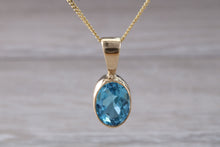 Load image into Gallery viewer, Swiss Blue Topaz set Yellow Gold Necklace