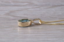 Load image into Gallery viewer, Swiss Blue Topaz set Yellow Gold Necklace