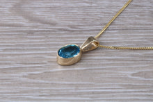 Load image into Gallery viewer, Swiss Blue Topaz set Yellow Gold Necklace