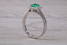 Load image into Gallery viewer, Emerald and Diamond Halo set Platinum Ring