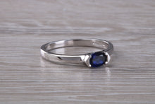 Load image into Gallery viewer, Half carat Oval cut Blue Sapphire set 18ct White Gold Ring