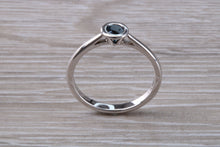 Load image into Gallery viewer, Beautiful Royal Blue Sapphire Rub Over set in 18ct White Gold Solitaire