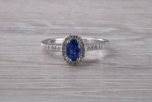 Load image into Gallery viewer, Absolutely Beautiful Blue Sapphire and Halo set Diamond Ring