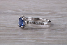 Load image into Gallery viewer, Absolutely Beautiful Blue Sapphire and Halo set Diamond Ring