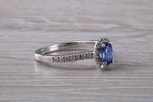 Load image into Gallery viewer, Absolutely Beautiful Blue Sapphire and Halo set Diamond Ring
