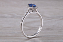 Load image into Gallery viewer, Absolutely Beautiful Blue Sapphire and Halo set Diamond Ring