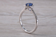 Load image into Gallery viewer, Absolutely Beautiful Blue Sapphire and Halo set Diamond Ring
