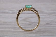 Load image into Gallery viewer, Dainty Oval cut Emerald and Diamond set Yellow Gold Ring