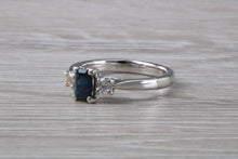 Load image into Gallery viewer, Emerald cut Blue Sapphire and Diamond Trilogy Ring