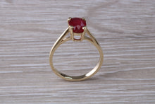 Load image into Gallery viewer, Two carat Oval cut Ruby set Yellow Gold Solitaire