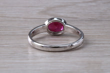 Load image into Gallery viewer, 1.25 carat Oval cut Ruby set 18ct White Gold Solitaire