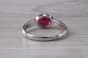 1.25 carat Oval cut Ruby set 18ct White Gold Solitaire