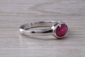 1.25 carat Oval cut Ruby set 18ct White Gold Solitaire
