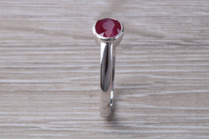 1.25 carat Oval cut Ruby set 18ct White Gold Solitaire