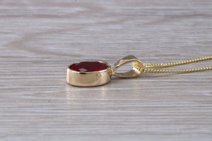 Oval cut Ruby set Yellow Gold Solitaire Necklace