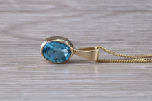 Load image into Gallery viewer, Swiss Blue Topaz set Yellow Gold Necklace